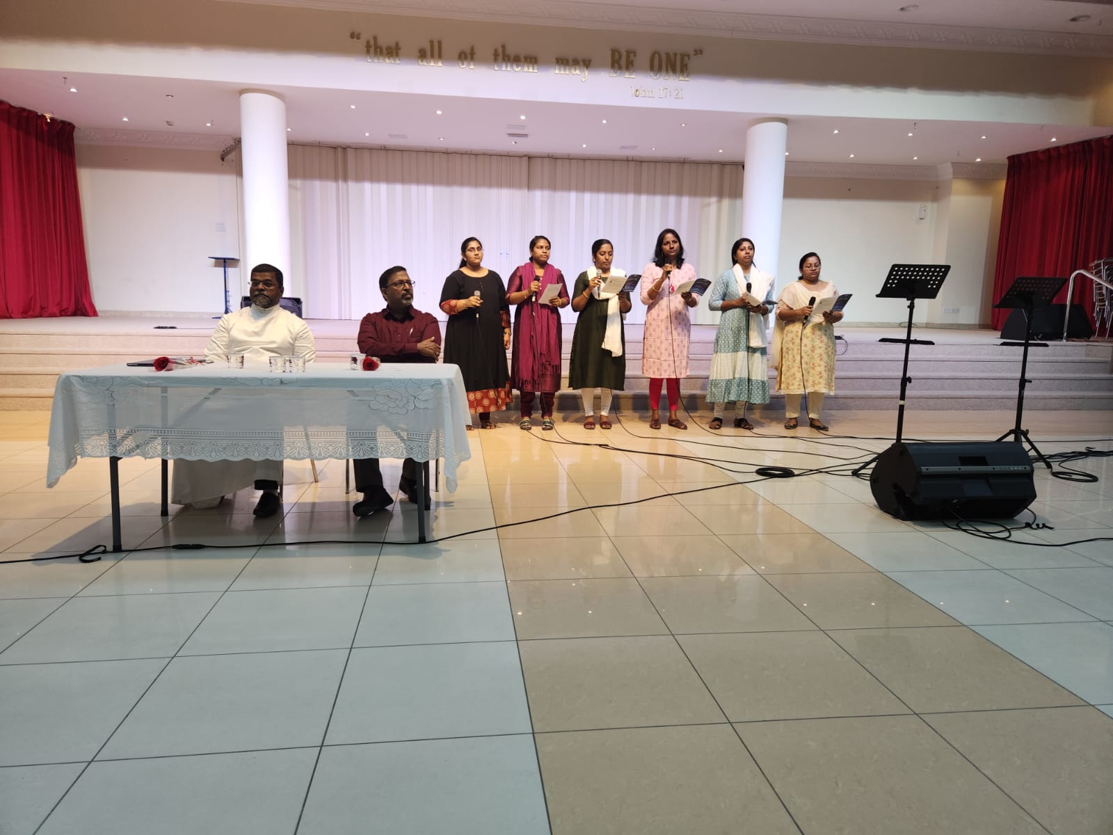 Singing session led by Sunday School teachers